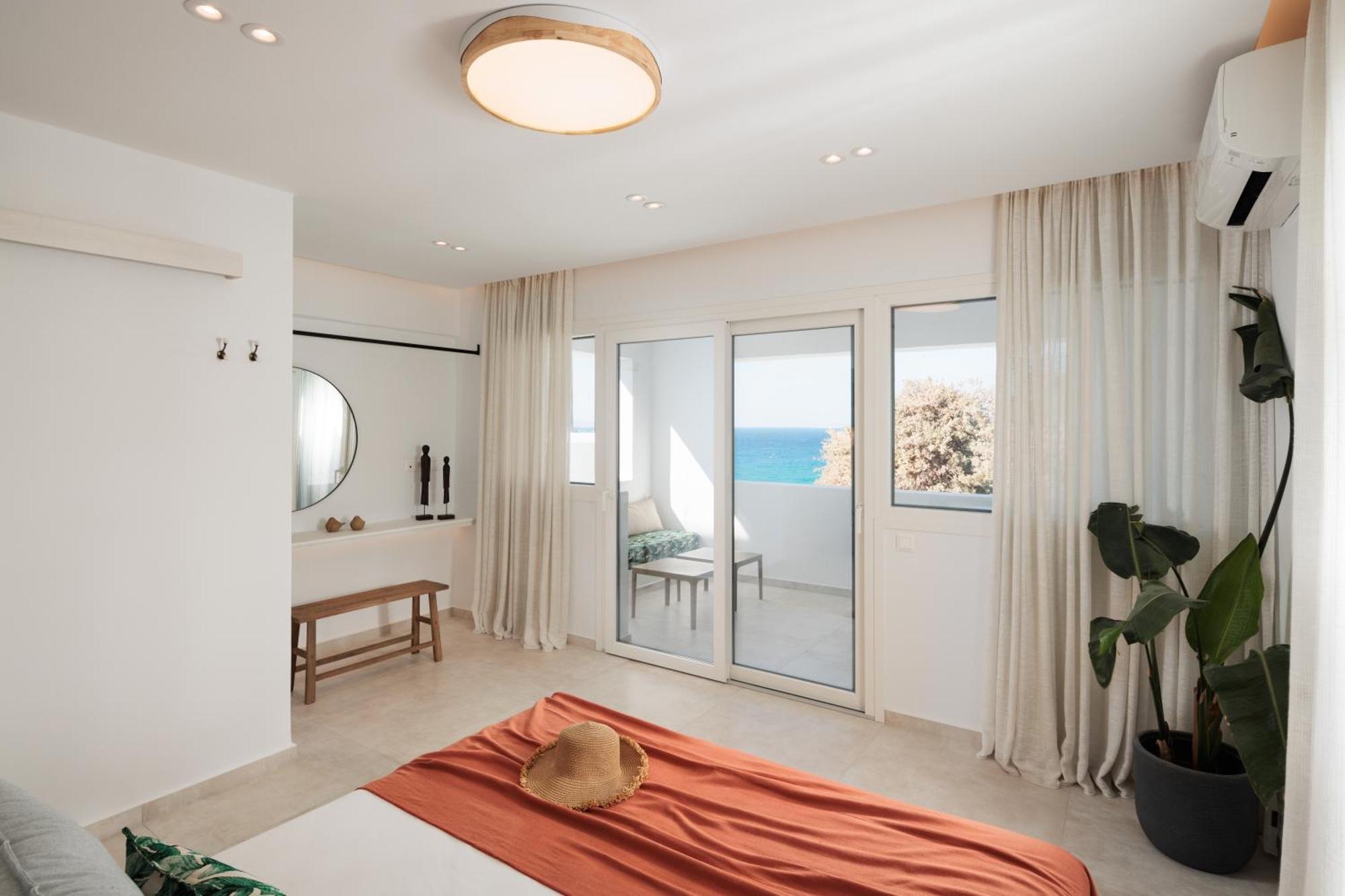 Seanfinity Beachfront Suites Μικρή Βίγλα Δωμάτιο φωτογραφία
