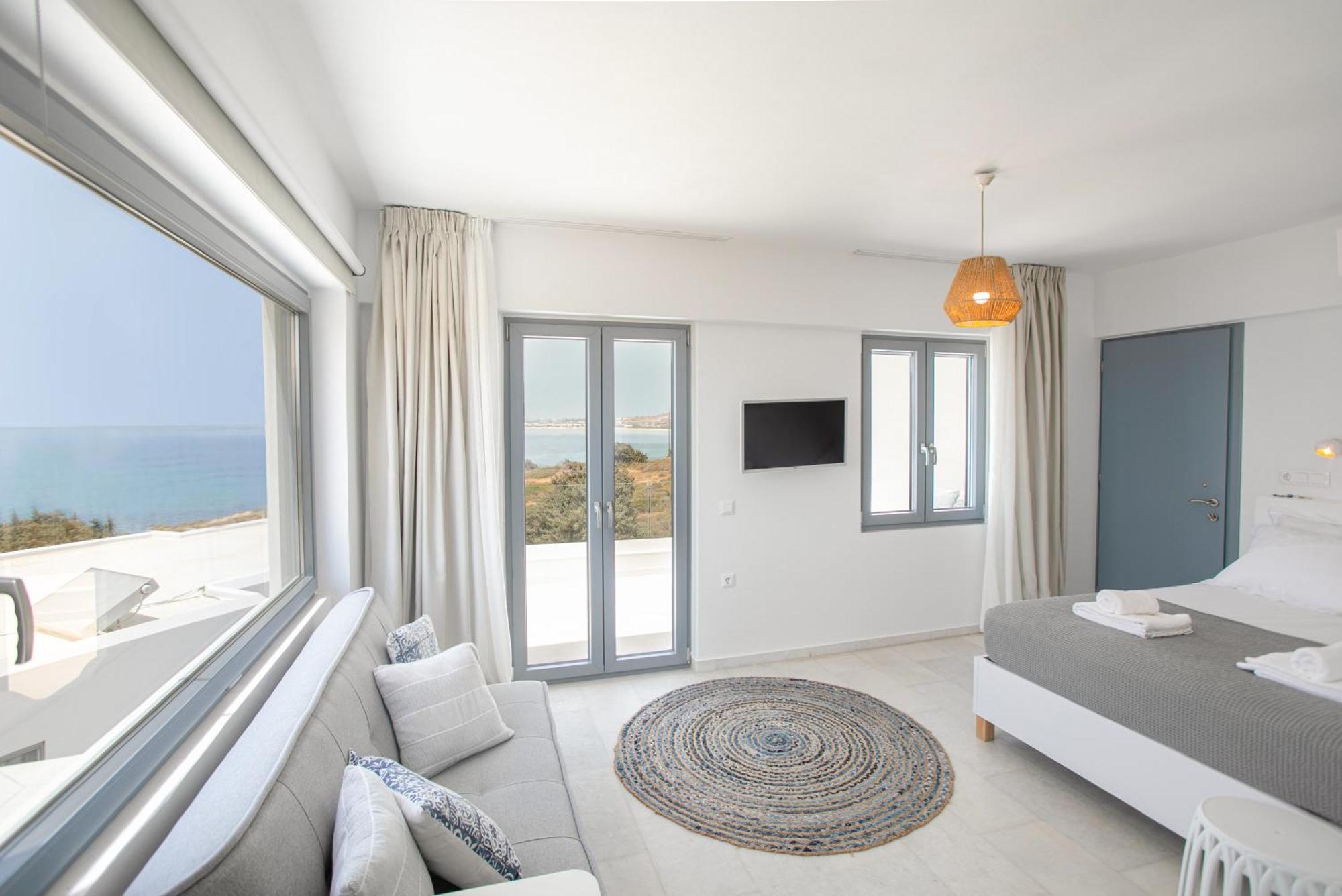 Seanfinity Beachfront Suites Μικρή Βίγλα Δωμάτιο φωτογραφία